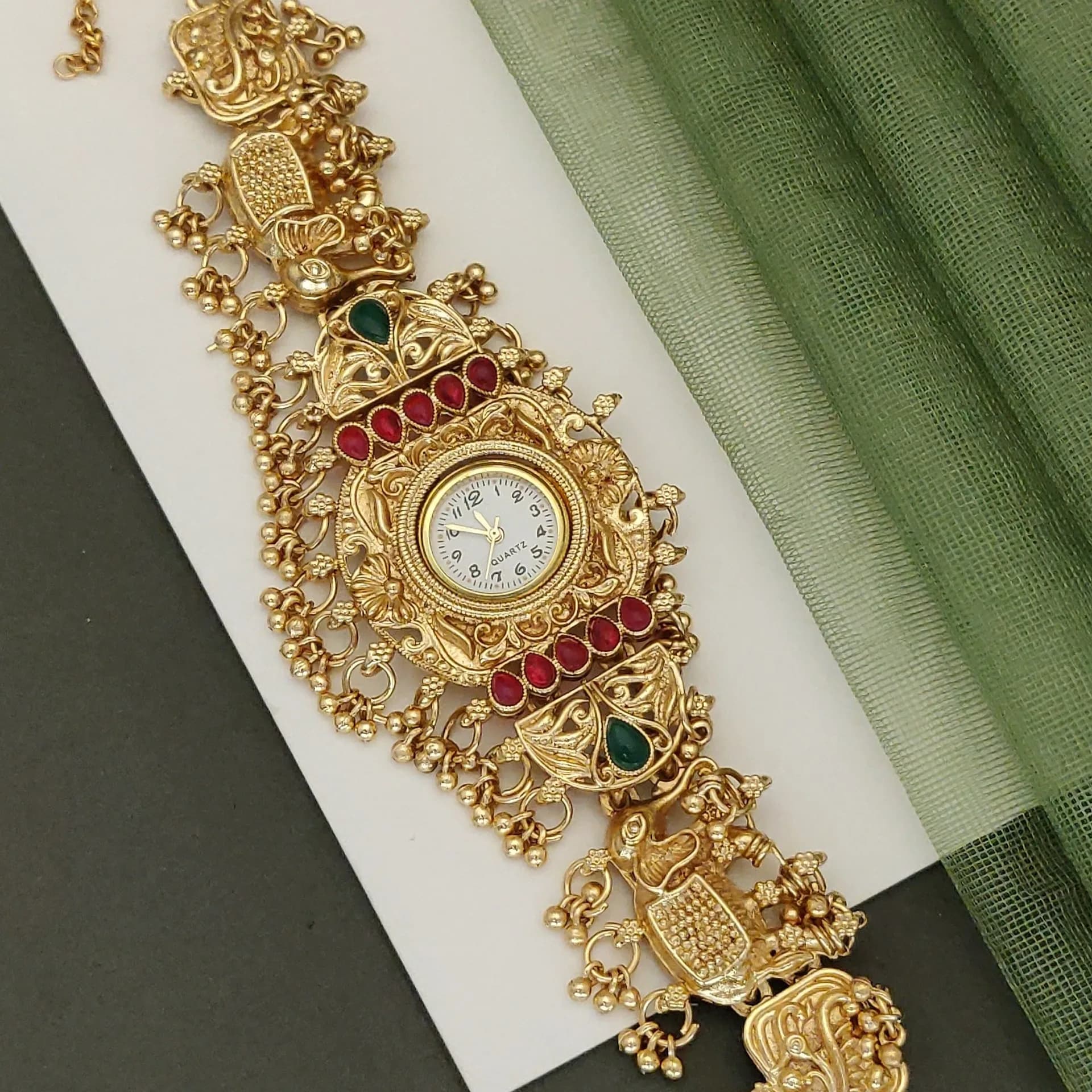 Royal Ethnic Gold Bracelet Watch for Women – Red & Green Traditional Charm Design